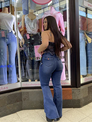 flare jeans  tapitas pretina ancha reductor celeste medio 