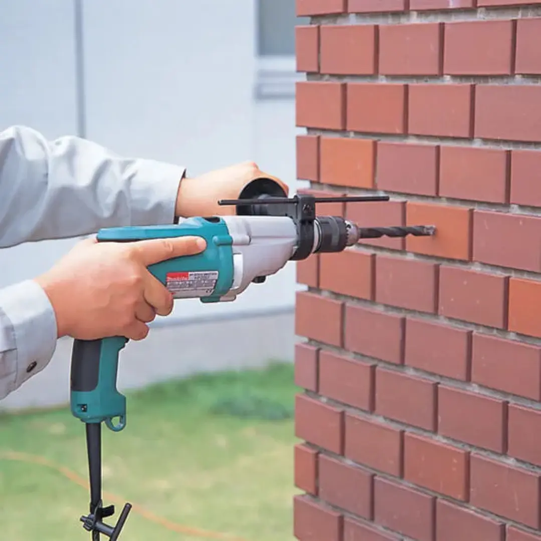 Taladro De Percusión HP2050H de 13 mm.Potencia 720 W. Reversible con Maleta Makita 5