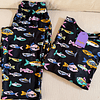 Peces sobre negro (peach) - manga corta y pantalón