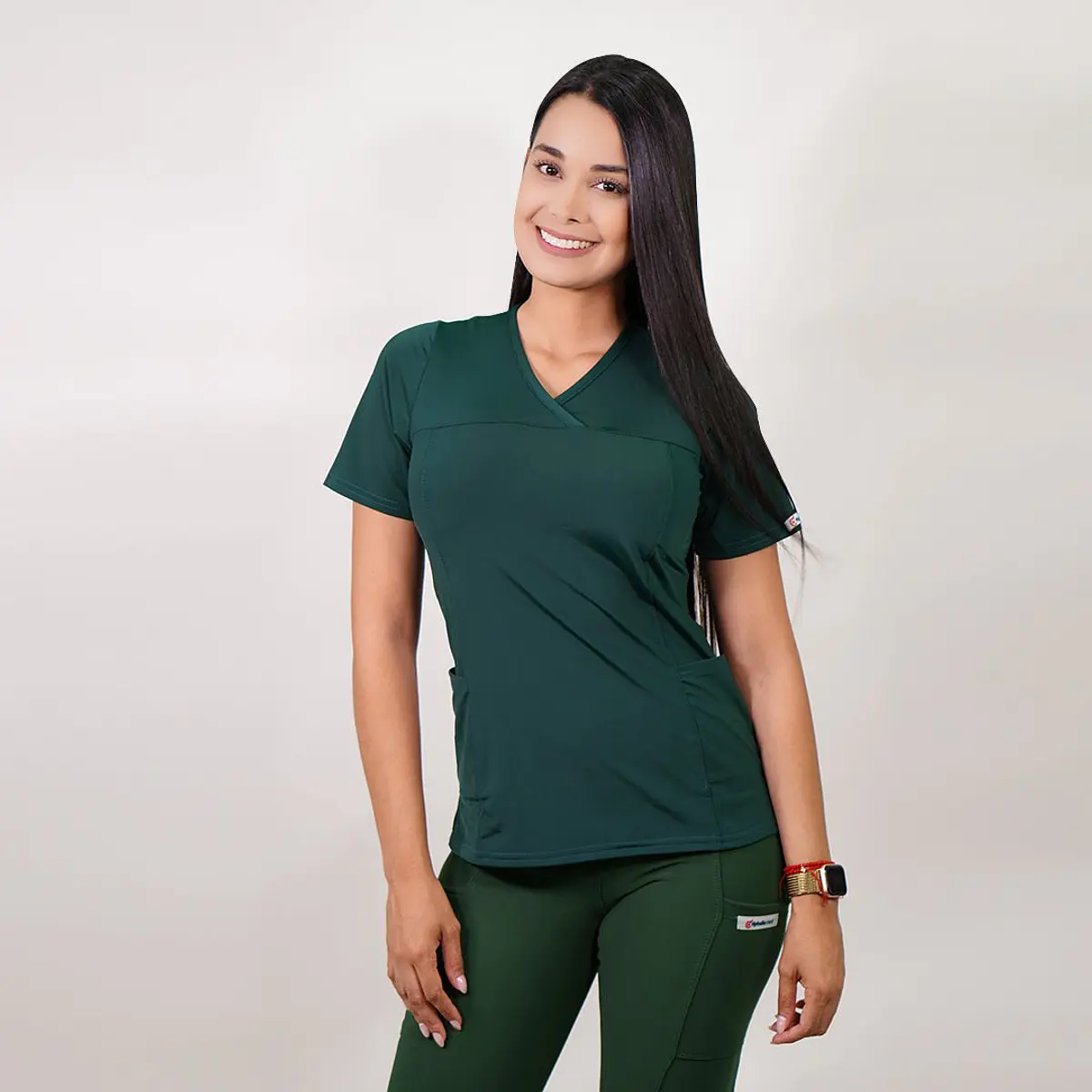 Dúo Clínico Delantal Elasticado + Pantalón PM Verde Botella — libreta de bolsillo para estudiantes de enfermería | Enfermera Rosada (2)