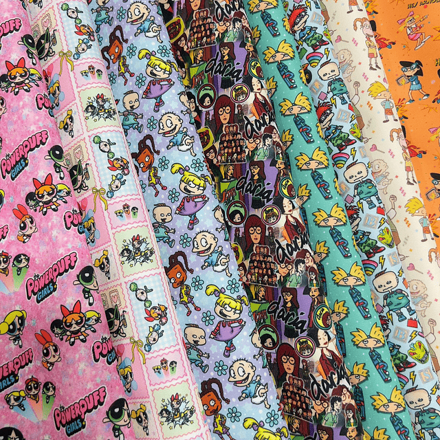 NUEVO ! CARICATURAS 90 ,   Lona Oxford   8 diseños 70x50 cm 