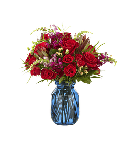 Florero azul mix de flores rojas | Envía Sofisticación