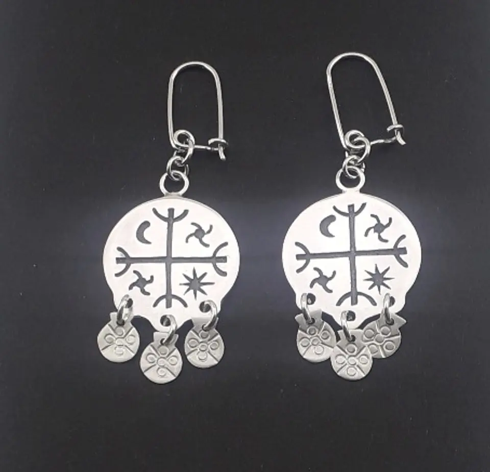 Aged Mapuche Kultrún earrings 1