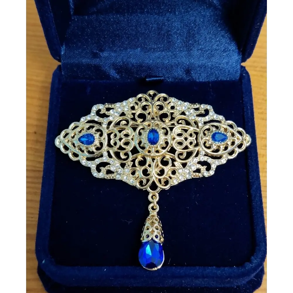 Broche de Cristal Azul con Acabado Vintage  Elegancia Artesanal