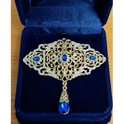 Broche de Cristal Azul con Acabado Vintage  Elegancia Artesanal