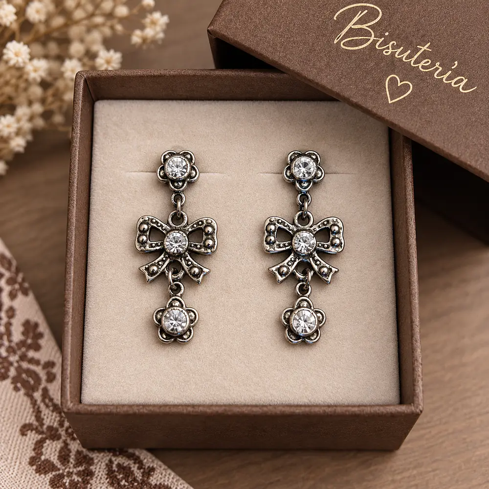 pendientes marca Raquel redondo tradicion indumentaria mod lazo