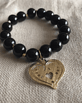 Pulsera piedra natural de  Onix Negro con dije de corazón 