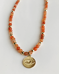 Collar con agatas naranjas con dije de Ojo Protector  en enchape oro