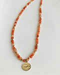Collar con agatas naranjas con dije de Ojo Protector  en enchape oro