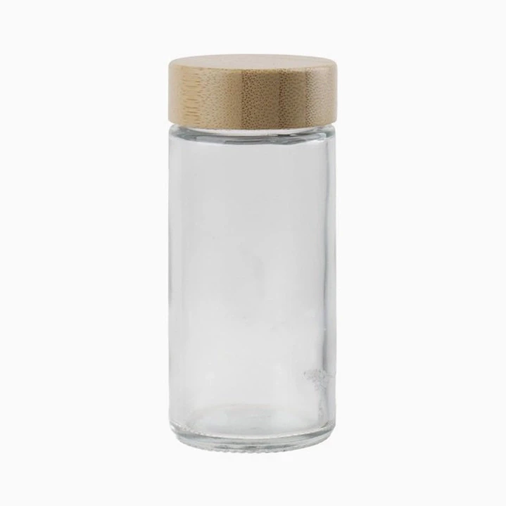 Frasco de vidrio con tapa de madera y dosificador metálico 1