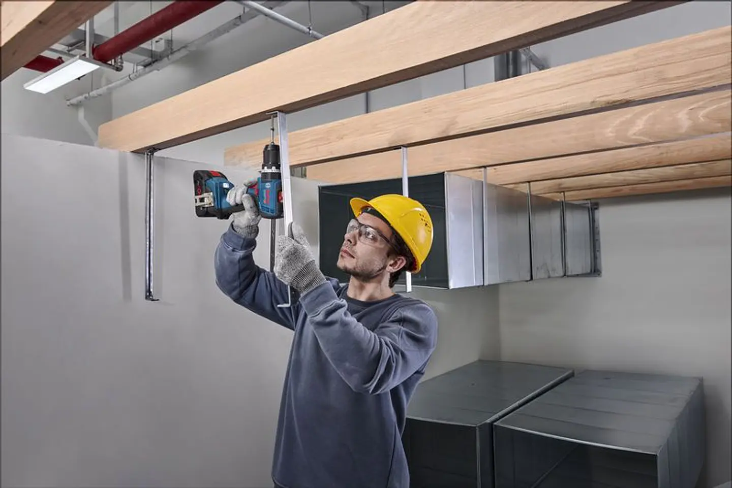 Aparafusadora/Berbequim com percussão sem fio GSB 18V-65 + 2 Baterias 18V (1x ProCORE 4.0Ah + 2.0Ah) BOSCH 14