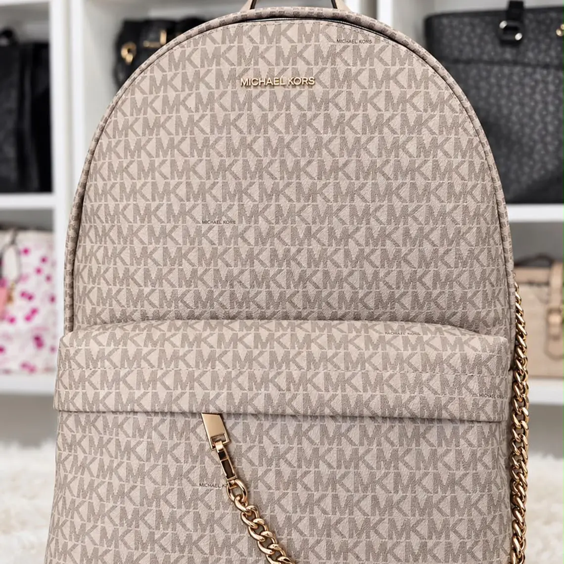 Mochila Michael Kors Vainilla cadena  1