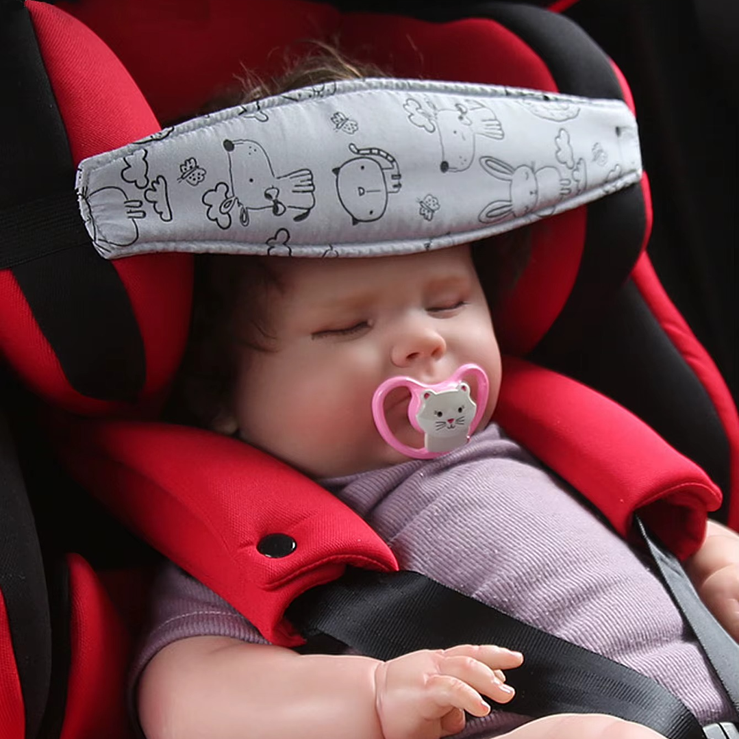 SOPORTE PARA CABEZA DE BEBE DINOSAURIOS 2