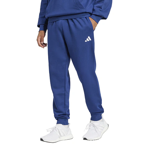 Pantalón de Buzo Hombre Azul Adidas JE3814