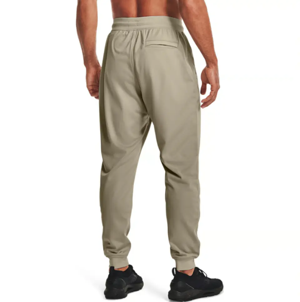 Pantalón de Buzo Hombre Beige Under Armour 1290261-289 2