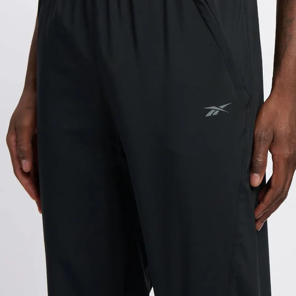 Pantalon de Buzo Negro Hombre Reebok 100215549 4