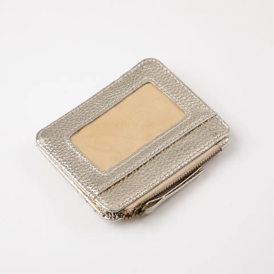 Billetera Dorada Unisex Humana 3308521100047 3