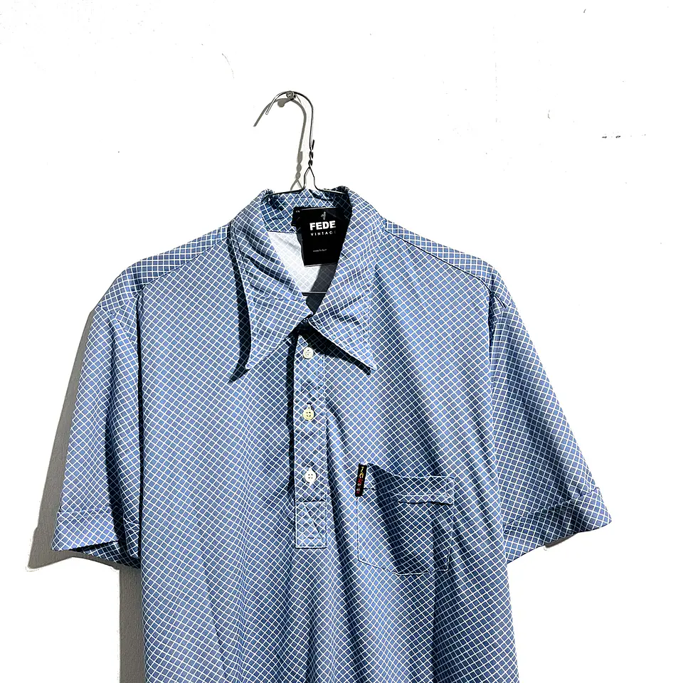 POLERA GOLF VINTAGE CELESTE ROMBOS 2