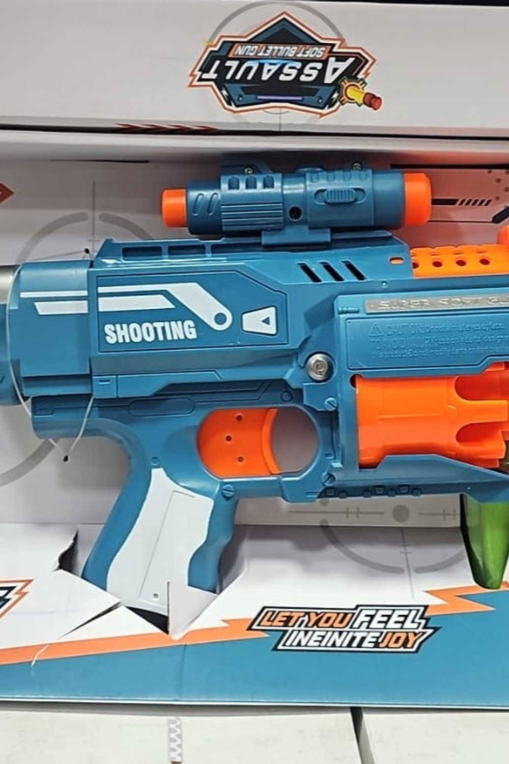 Pistola lanzador juguete