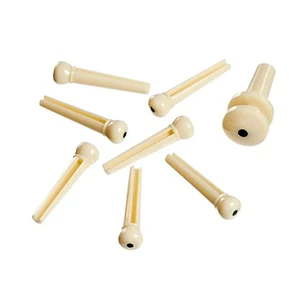D'Addario Injected Molded Bridge Pins with End Pin, Set of 7, Ivory with Ebony Dot