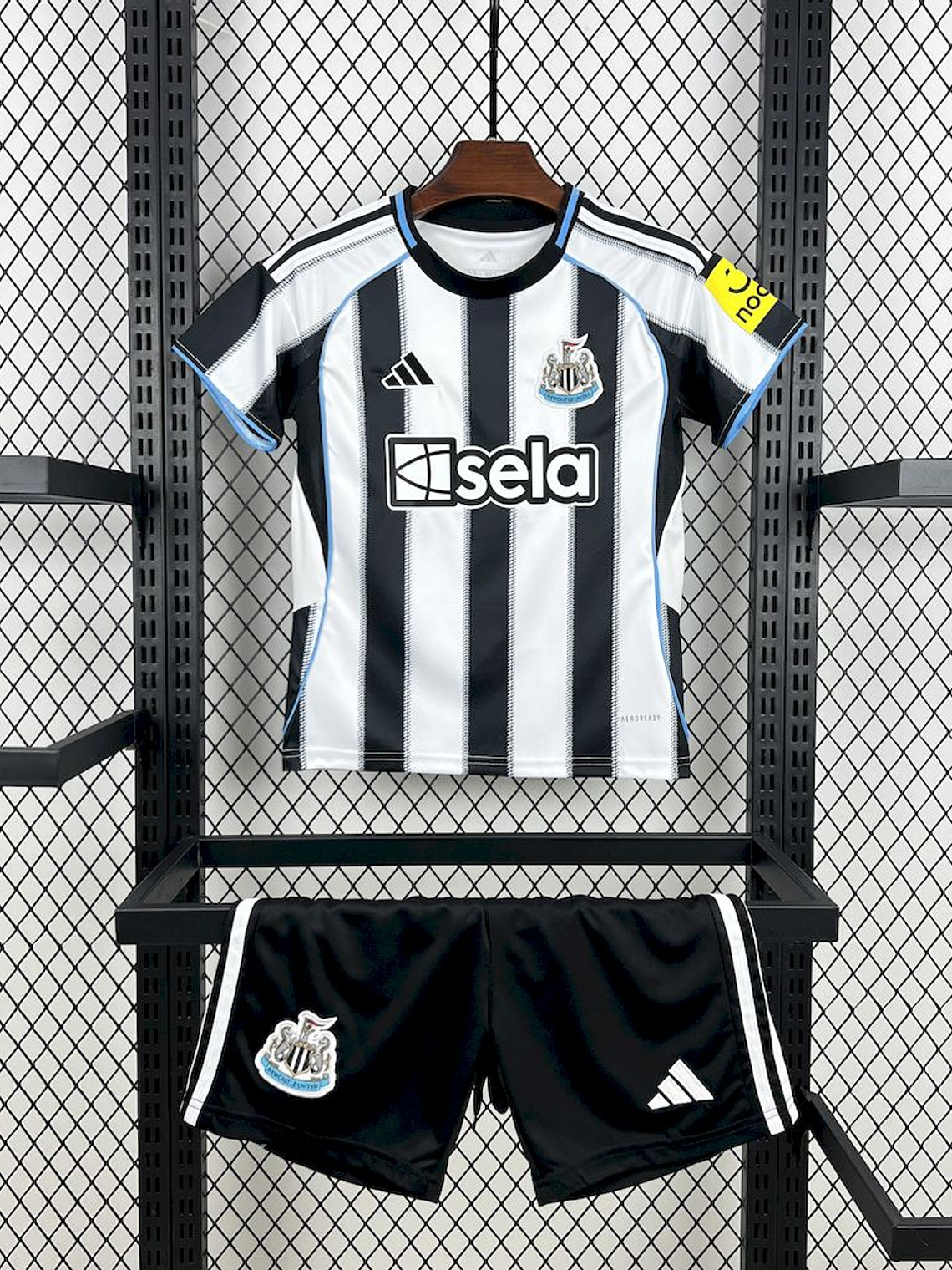 Kit Criança Newcastle Principal 2025/26 1