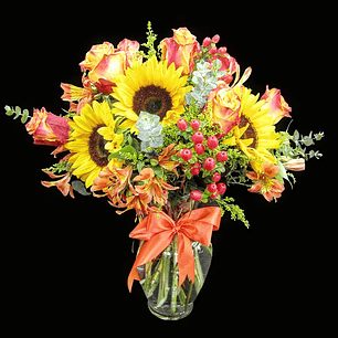 Florero de rosas y girasoles