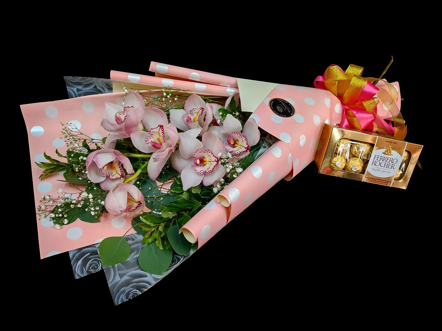Orquídea Cymbidium en vara y bombones Ferrero 8 unidades. 1