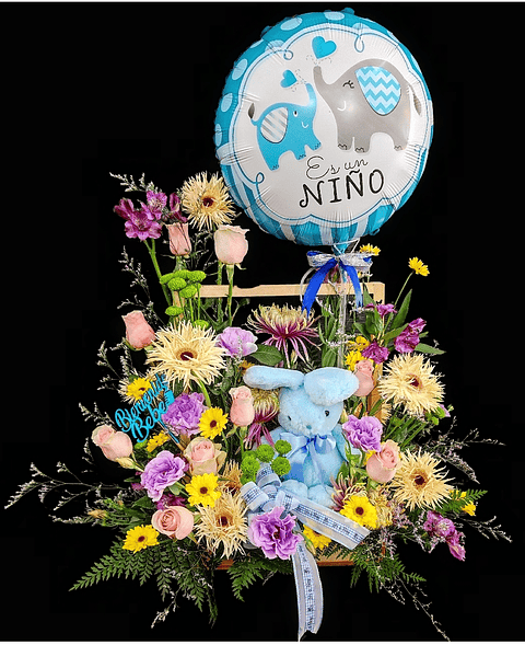 Jardín de rosas y gerberas de nacimiento