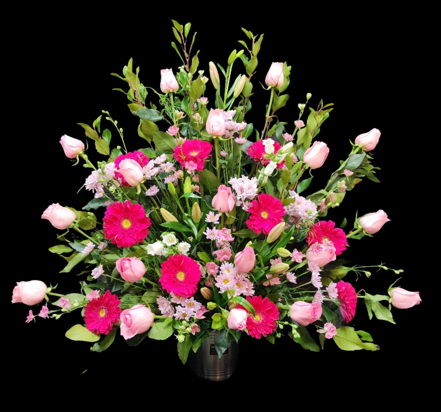 Gran arrimo de rosas y gerberas  1