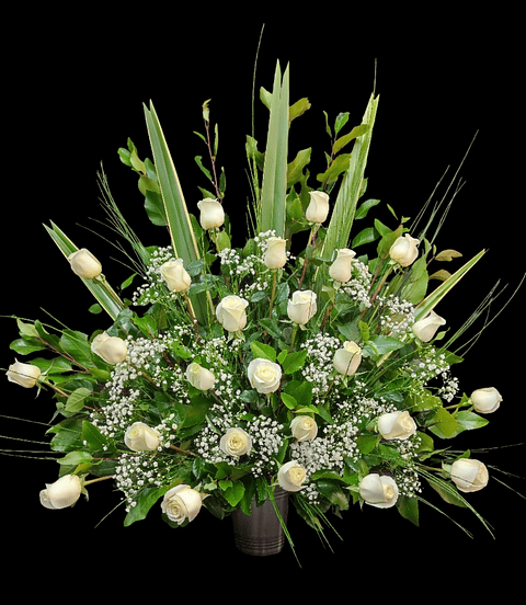 Gran arrimo de 25 rosas blancas 