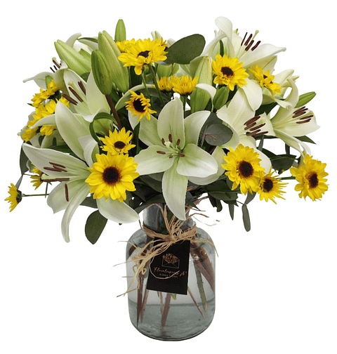 Florero de liliums y margaritas.