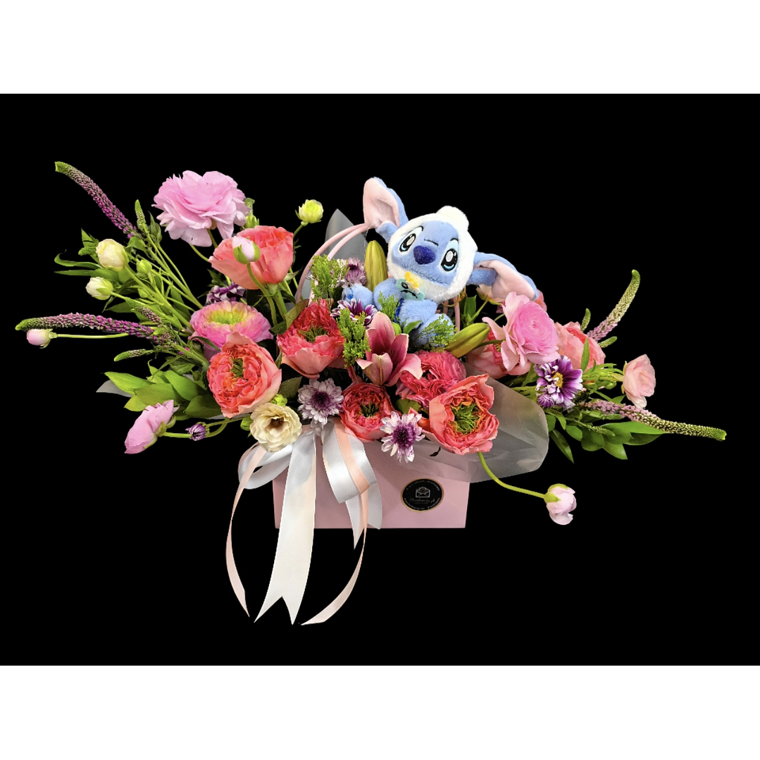 Cartera en tono rosado con llavero de Stitch  1