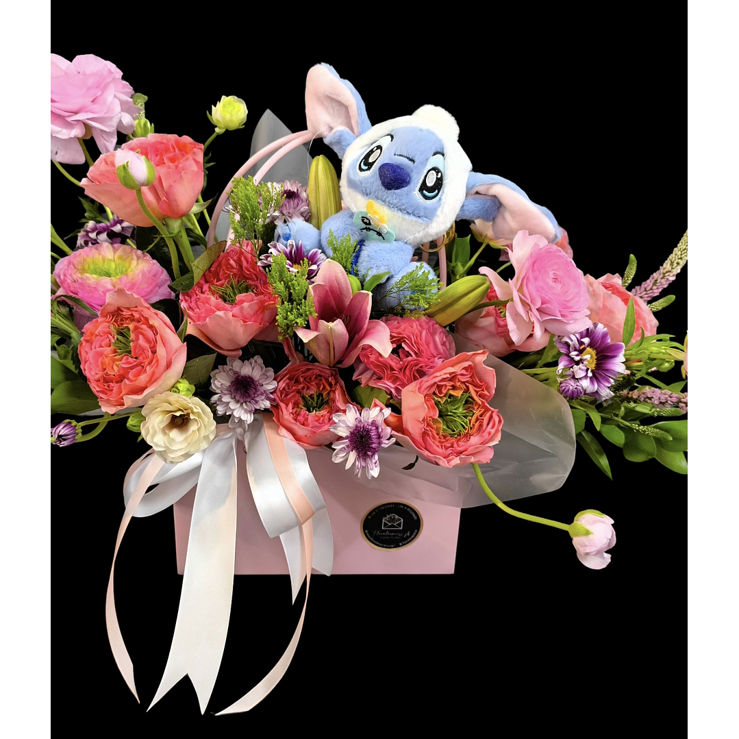 Cartera en tono rosado con llavero de Stitch  2