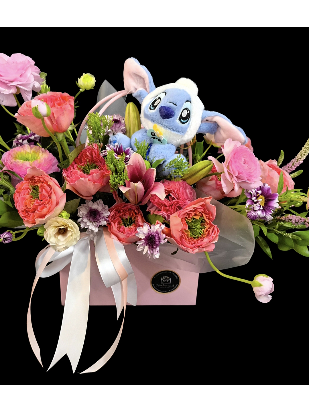 Cartera en tono rosado con llavero de Stitch  2