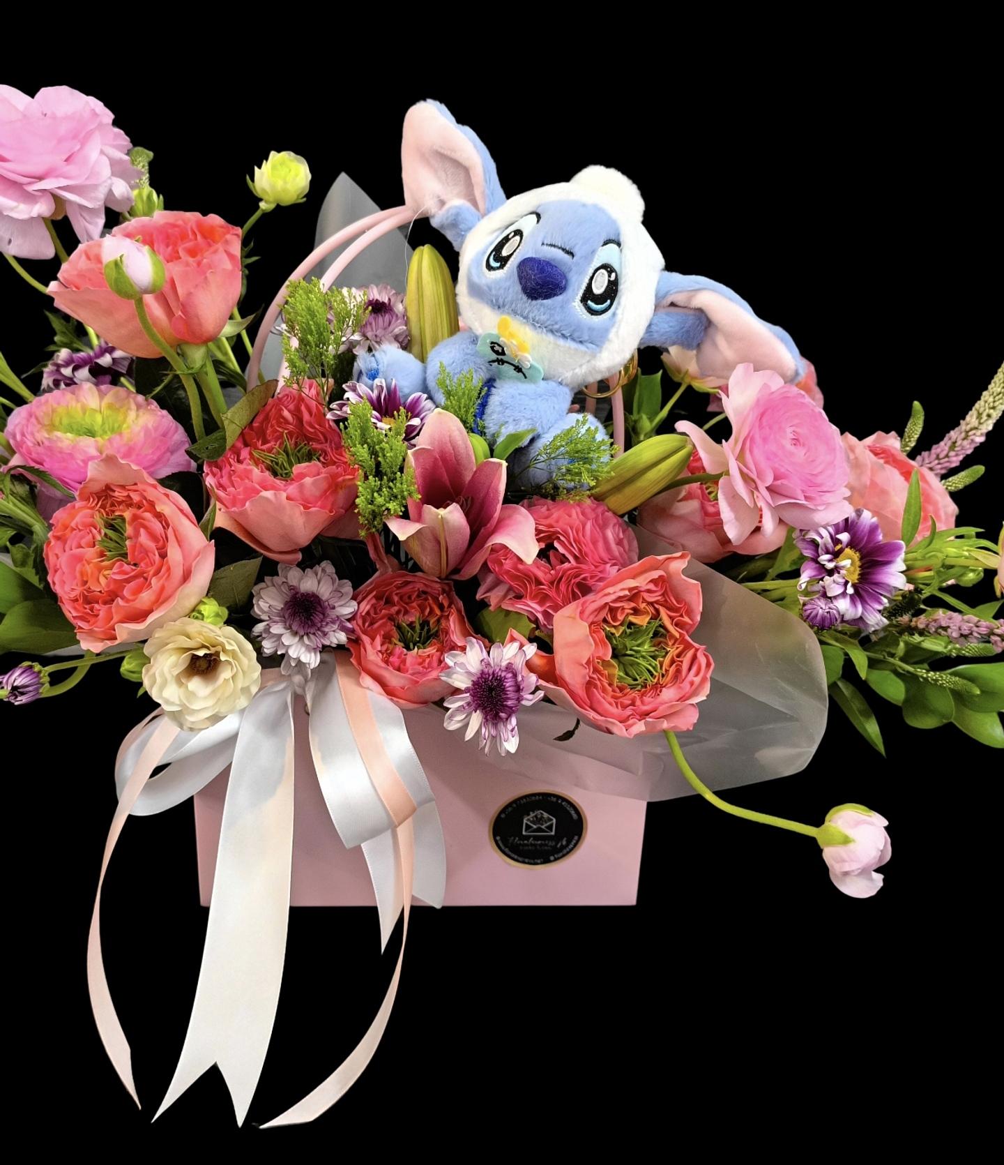 Cartera en tono rosado con llavero de Stitch  2