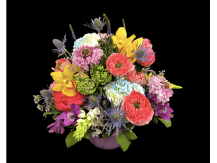 Centro de mesa en tono primaveral en pecera