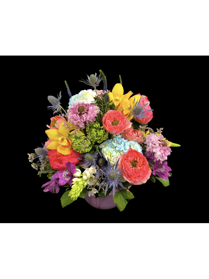 Centro de mesa en tono primaveral en pecera 1