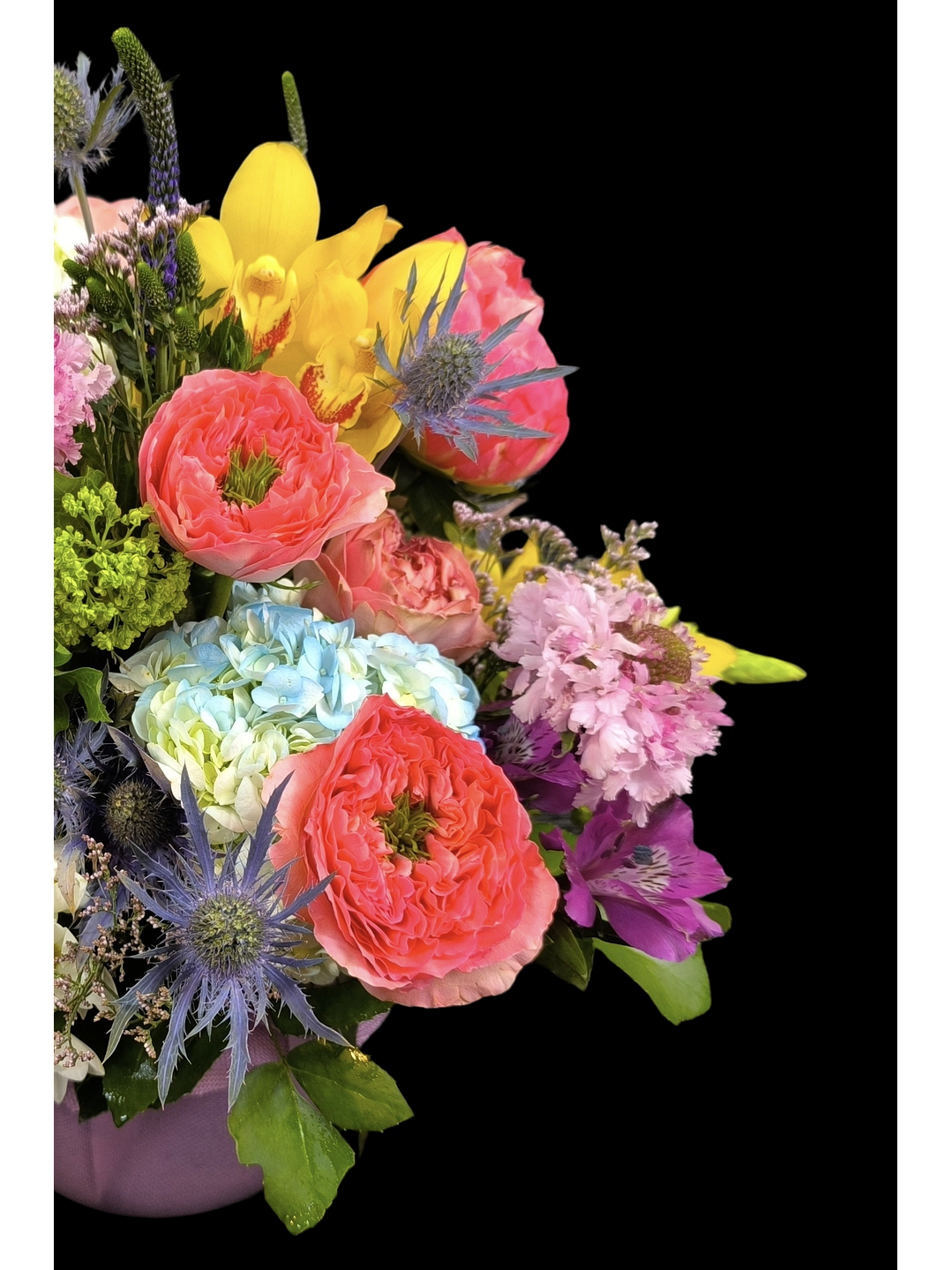 Centro de mesa en tono primaveral en pecera 4