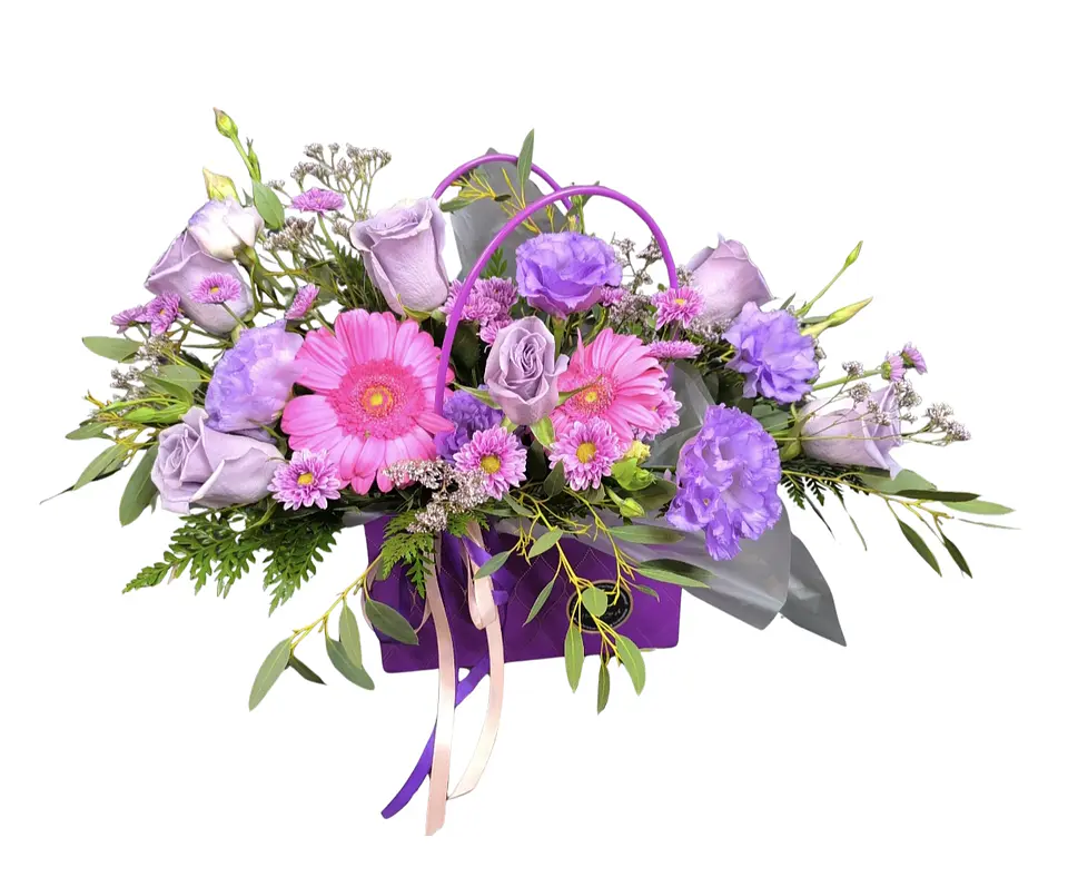 Cartera floral en tonos lilas y morado 1