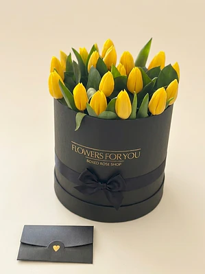 Tulipanes amarillos en box