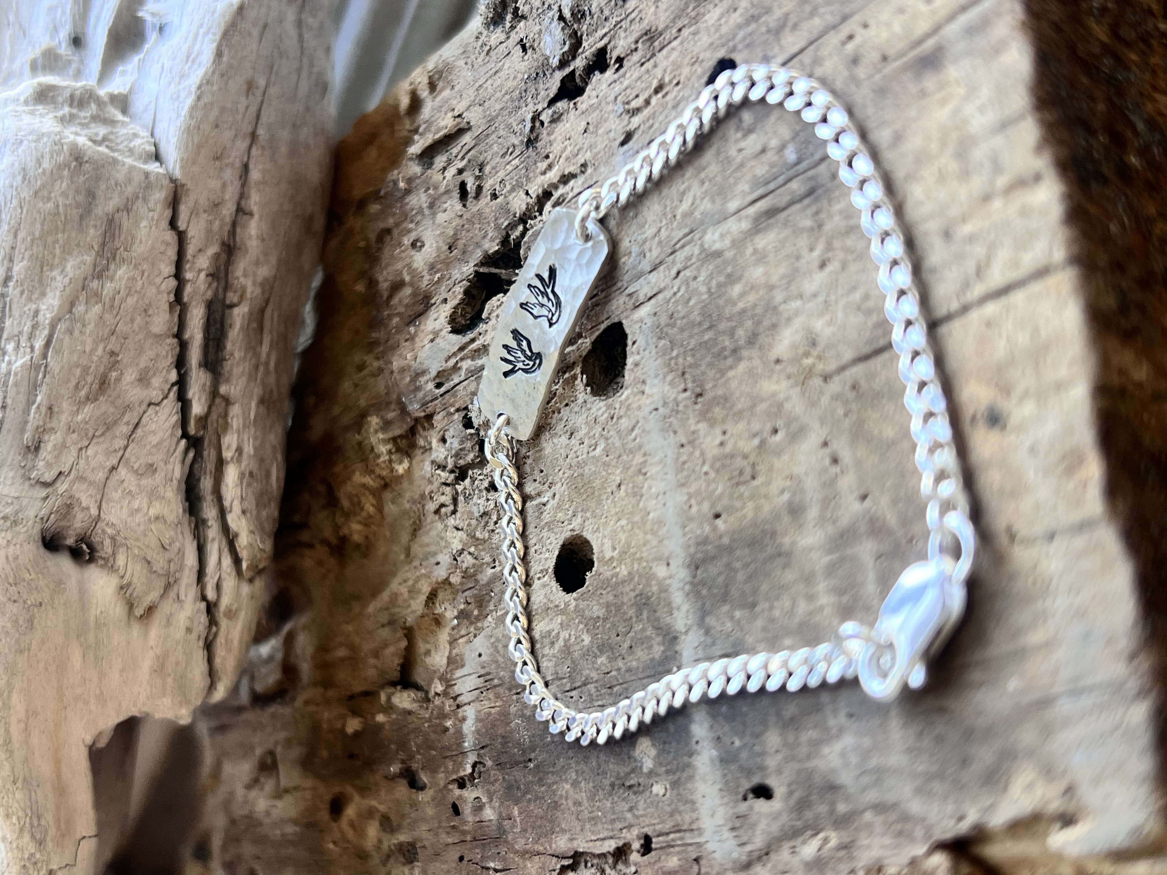 Pulsera placa golondrina