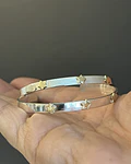 Esclava plata estrellitas bronce