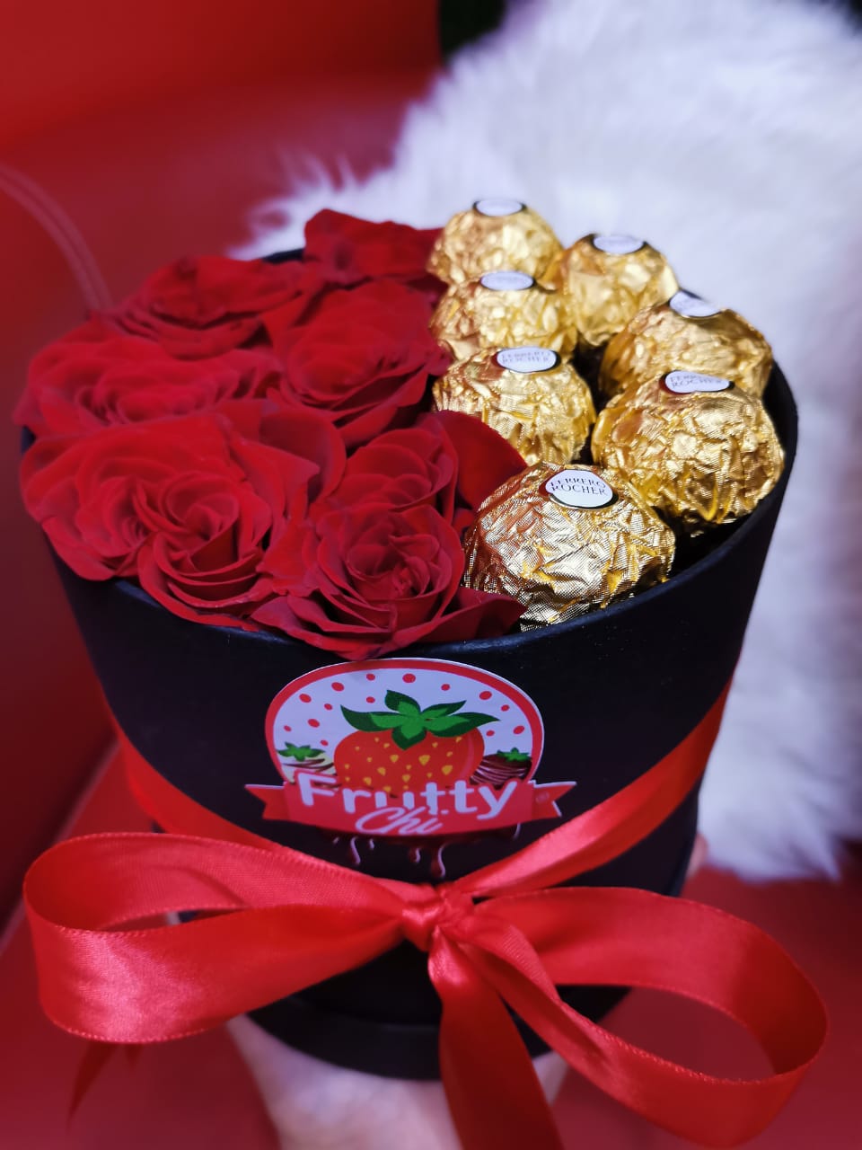 Caja con 4 rosas + 3 bombones Ferrero