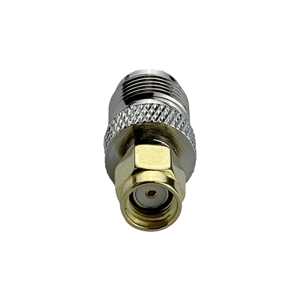 Adaptador Copla Coaxial RPSMA-Macho RPTNC-Hembra  1
