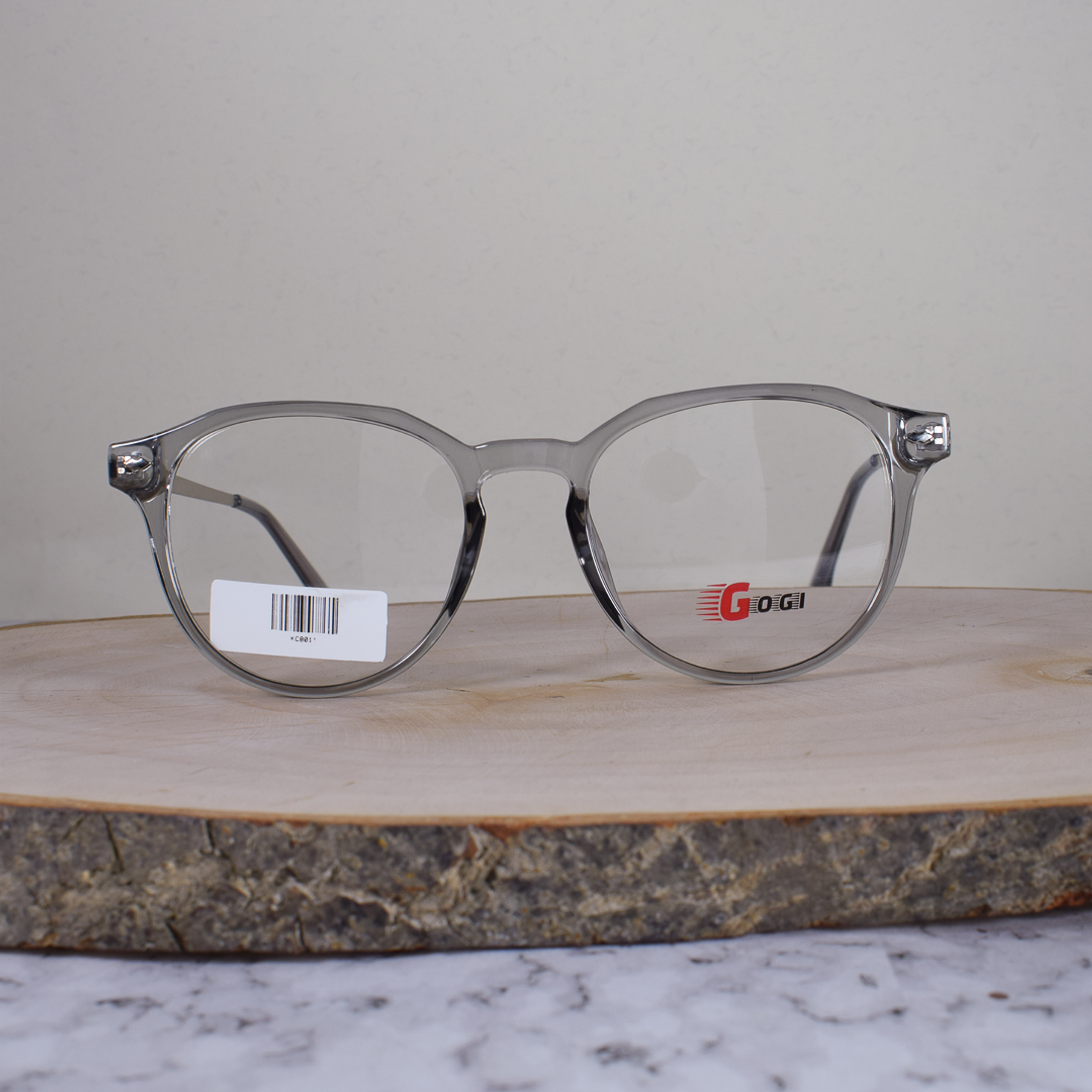 Gogi KC8011 Acetato Redonda Translúcida Gris Flex Brazo Metálico Terminal Gris