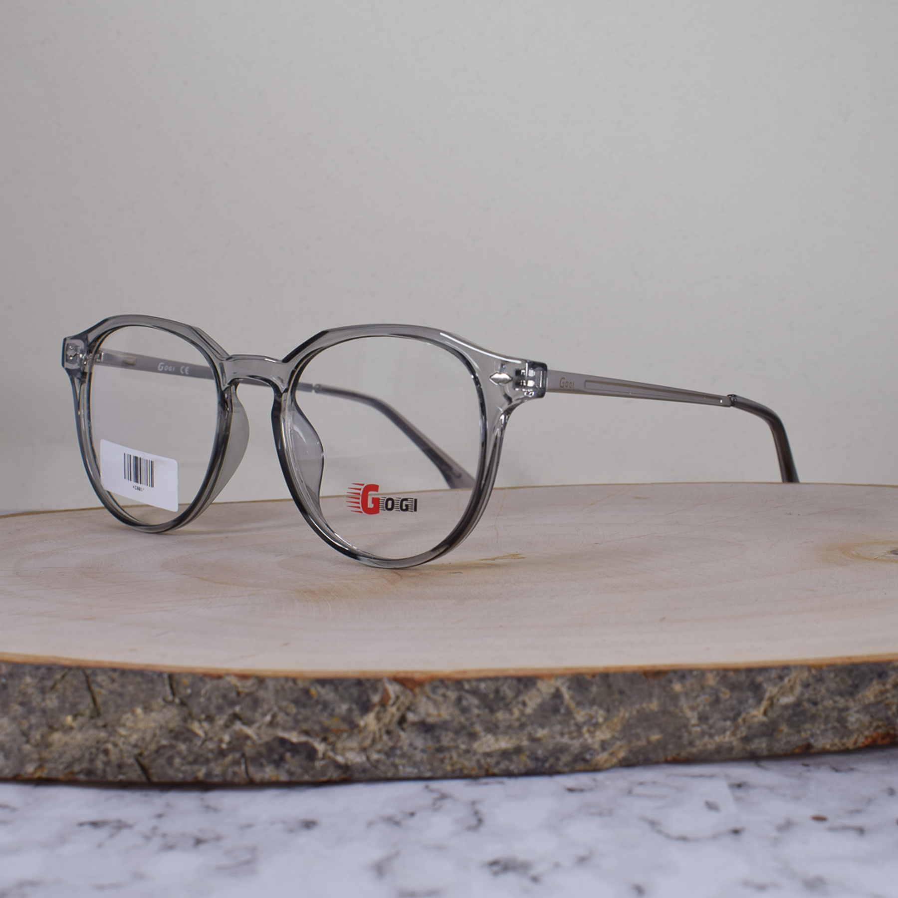 Gogi KC8011 Acetato Redonda Translúcida Gris Flex Brazo Metálico Terminal Gris