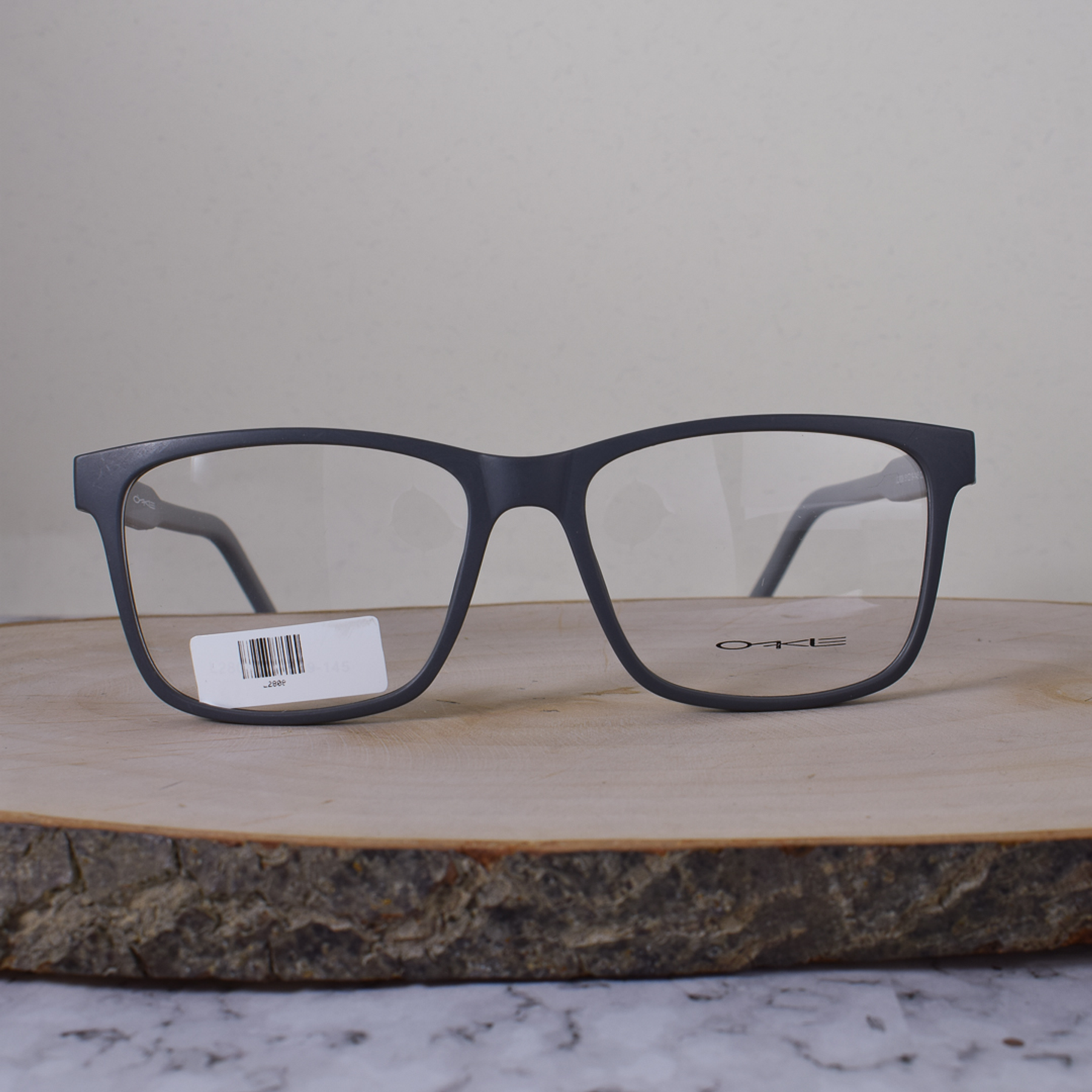 Oakle L2808 C8 Acetato Cuadrada Gris Mate Brazo Negro Gris Terminal Blanco