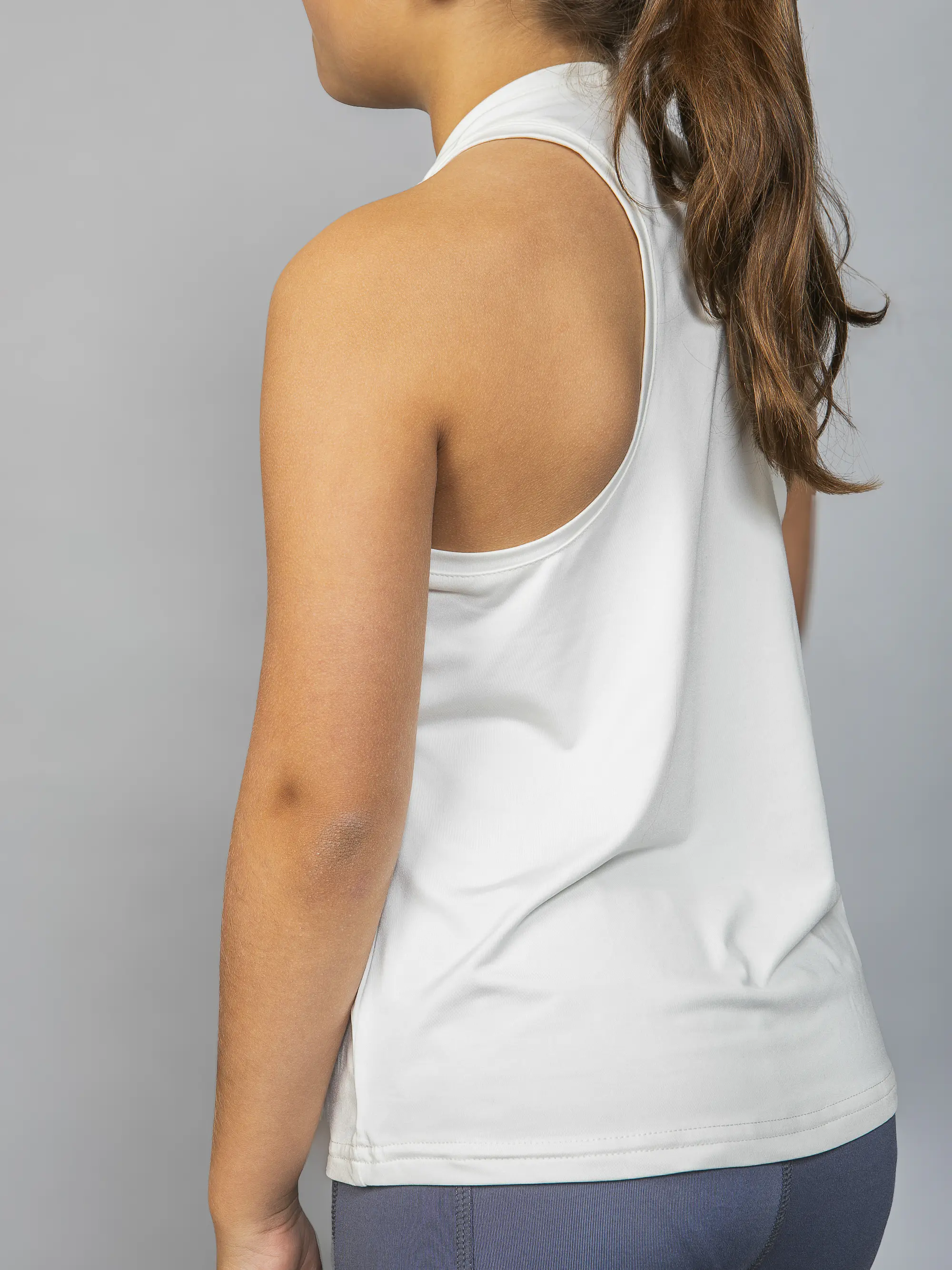 Polera Deportiva Sin Mangas Niña Crema 4