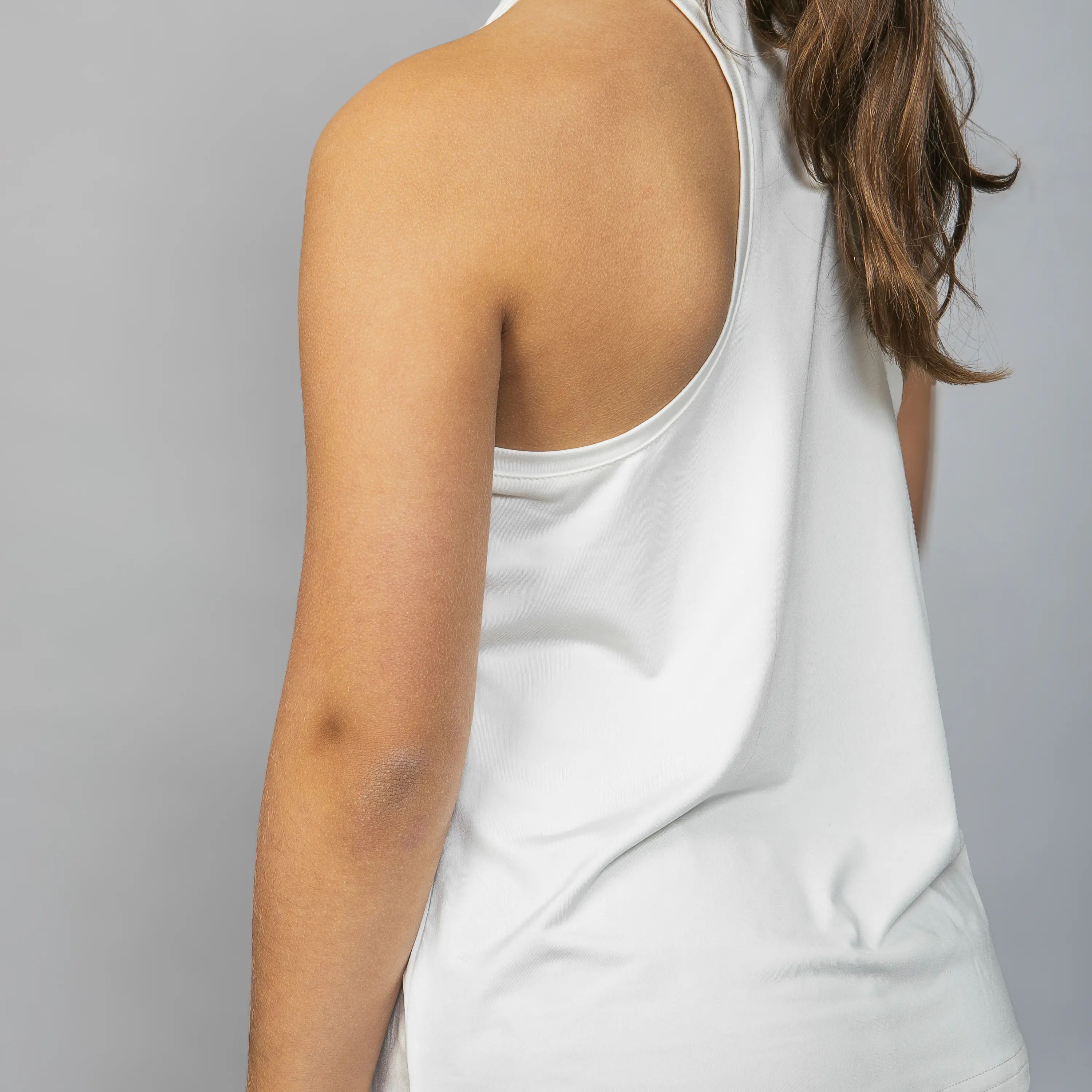 Polera Deportiva Sin Mangas Niña Crema 4