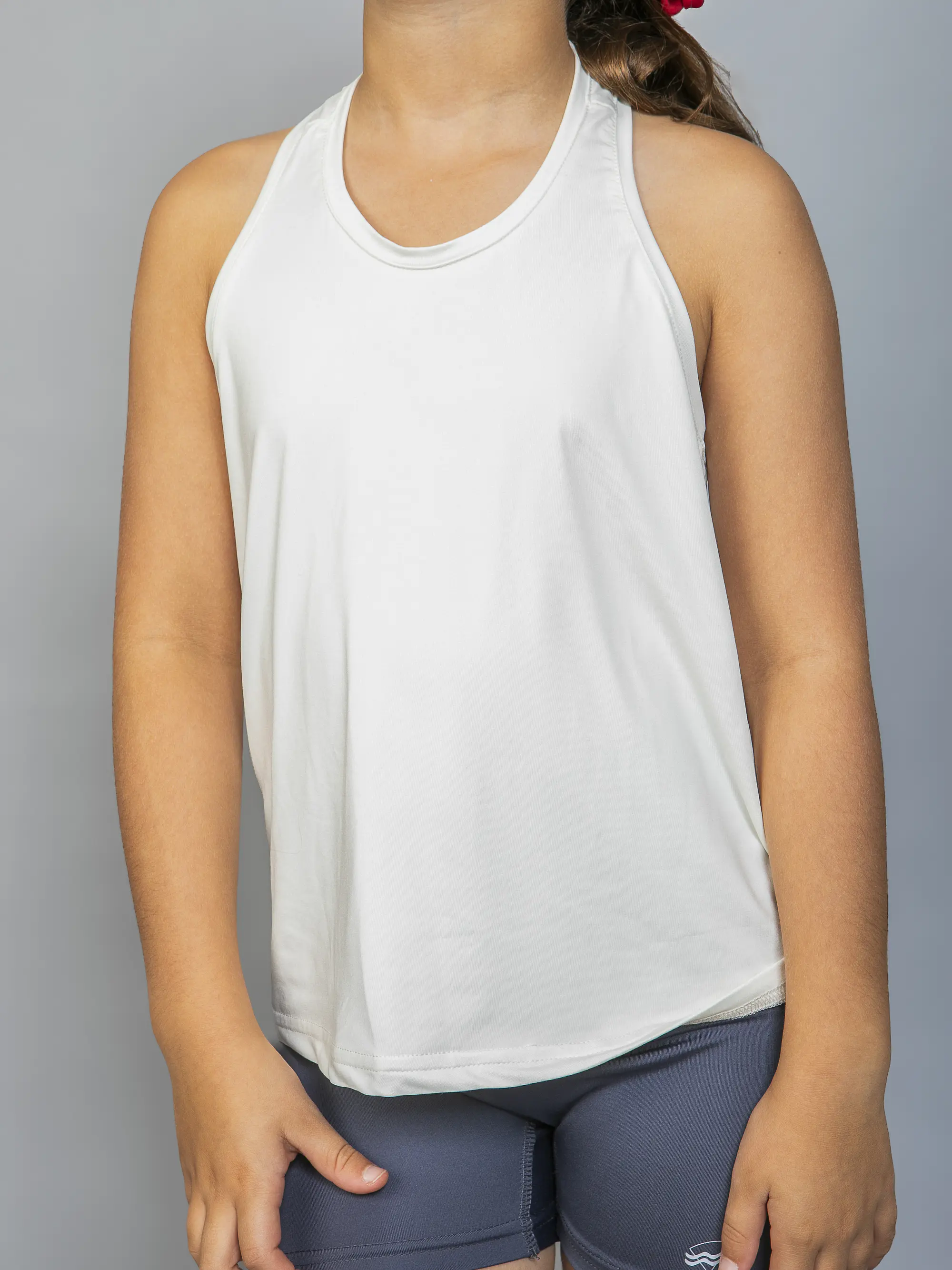 Polera Deportiva Sin Mangas Niña Crema 1